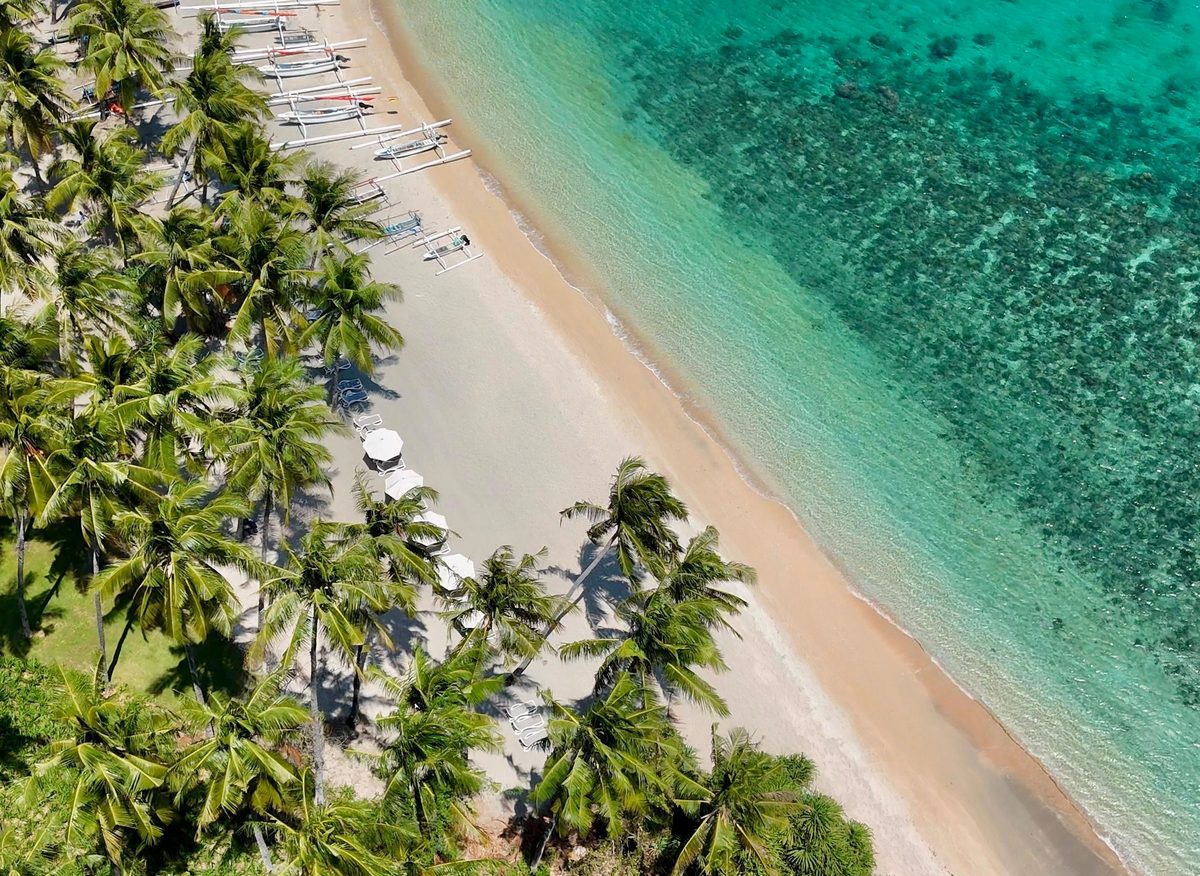 Mae Nam Beach, Koh Samui — turquoise water and palm-lined sand